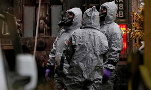 British military personnel in protective coveralls investigate the nerve agent attack in Salisbury