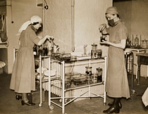 Nurses sterilising instruments