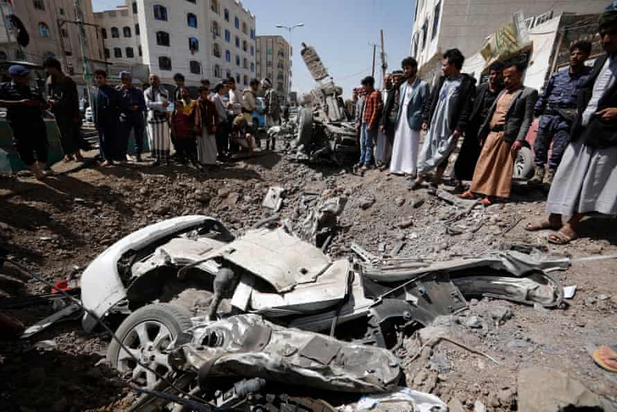 Yemenis inspect the site of Saudi-led airstrikes in Sana’a.