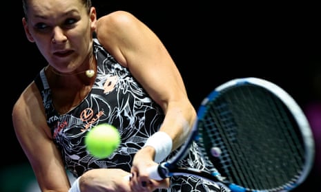 Agnieszka Radwanska returns a shot against Karolina Pliskova at the WTA FInals