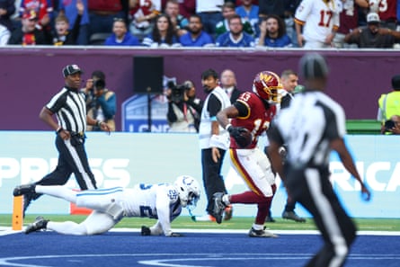 Treylon Burks scores a touchdown for Washington Commanders against Indianapolis Colts.