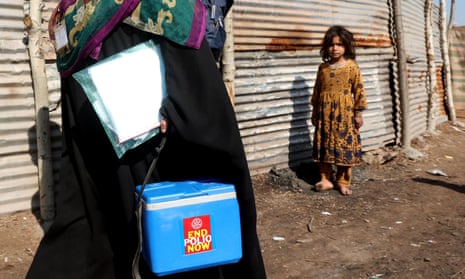 A health worker delivers the polio vaccine in Islamabad earlier this year in Pakistan’s latest drive to stamp out the disease.