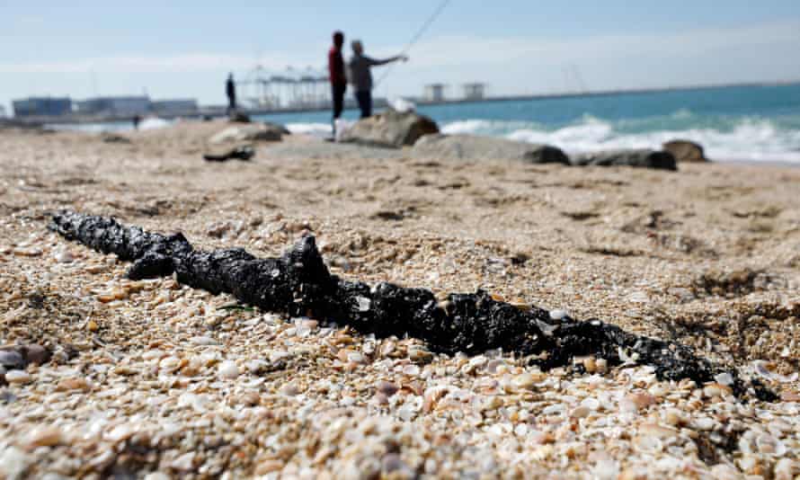 A clump of tar on a beach in Ashod, Israel