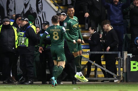 Whittaker celebrates after scoring Plymouth’s third goal.