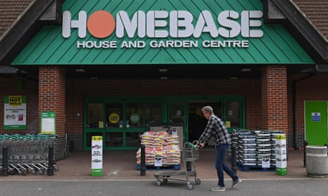 A customer passes by a Homebase store in High Wycombe, northwest of London, in 2018.