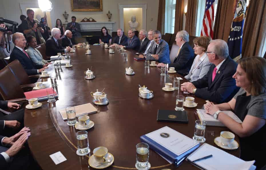 Barack Obama meets with members of Congress, including Harry Reid and Mitch McConnell, in the White House on 31 July 2014.