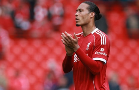 Virgil van Dijk applauds home fans following Liverpool’s draw with Chelsea at Anfield.