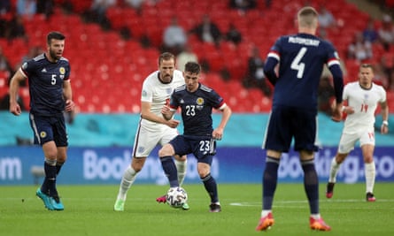 Billy Gilmour, pictured holding England’s Harry Kane at bay, impressed in his side’s Group D draw last Friday.