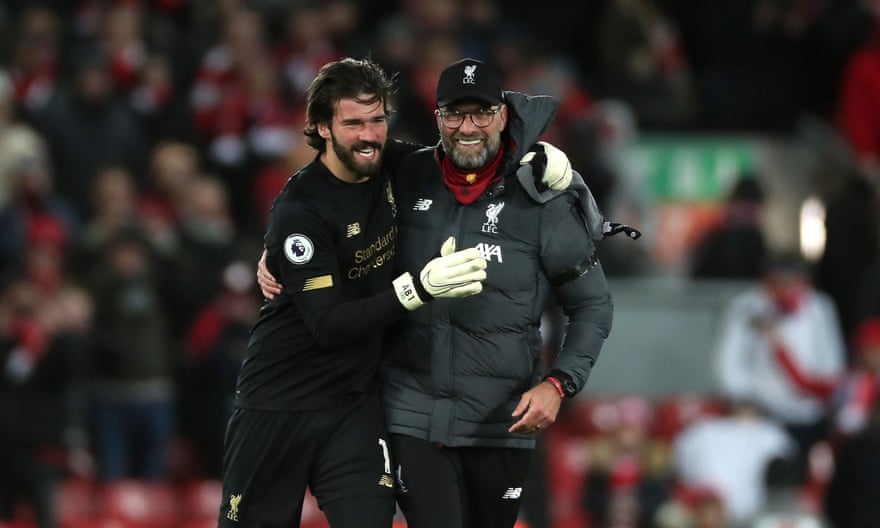 Man of the people: Jurgen Klopp with goalkeeper Alisson after the West Ham game last month.