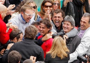 Nadal of Spain celebrates after winning the 2012 French Open men’s singles final match against Novak Djokovic.