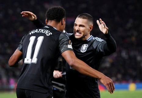 Ollie Watkins of Aston Villa celebrates scoring his team's second goal with Emi Buendia.