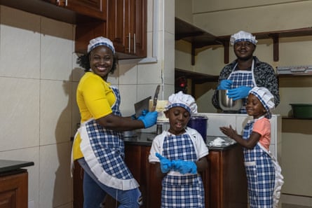The family that bakes together … Hope and her helpers in Kampala, Uganda.