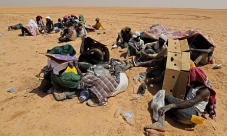 Migrants near Libya’s border town of Al-Assah