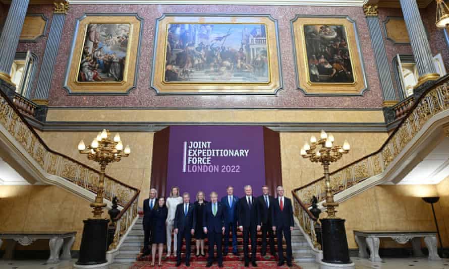 Boris Johnson posing for a family photo with leaders of the Joint Expeditionary Force countries after their meeting at Lancaster House.