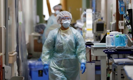 A staff member in the intensive care unit at St Marianna Medical University hospital in Kawasaki, south of Tokyo
