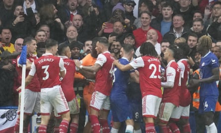 Players argue during the Premier League match between Chelsea and Arsenal.