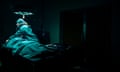 Urgency Accident Young adult doctor performing CPR on an injured patient in the operating room.<br>GettyImages-1445330505