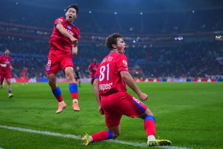 João Neves celebrates after scoring PSG’s late winner in Lyon.