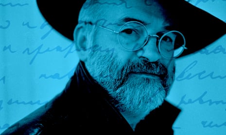 The author Terry Pratchett with his distinctive hat, beard and glasses.