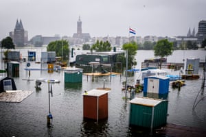 Roermond, The Netherlands: The Maas rises to a record height and floods campers at De Hatenboer.