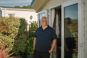 Philip takes a moment to consider his parents, both of whom he lost to Covid-19 within 48 hours. © Simon Bray