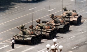 A Chinese man stands alone to block a line of tanks in Tiananmen Square, 1989. 3000.jpg?w=300&q=55&auto=format&usm=12&f