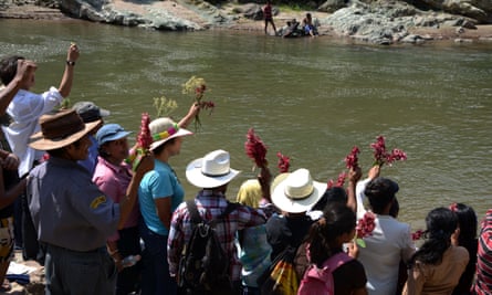 People honour the late assassinated environmentalist Berta Cáceres with a religious ceremony on the Gualcarque River near Tegucigalpa in 2016.