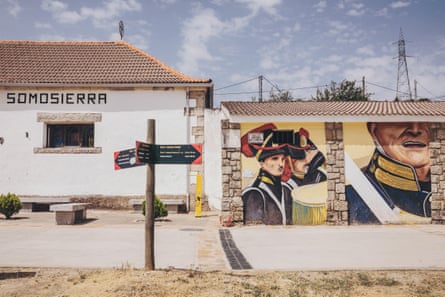 Murals adorn buildings in the village of Somosierra.