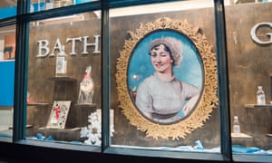 A display of Bath Gin in the window of a shop in the centre of the city of Bath makes use of a large portrait of Jane Austen.