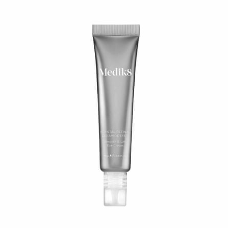 A silver tube of Medik8 Crystal Retinal Ceramide Eye Serum.
