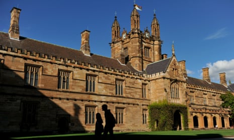 Students walk through The Quadrangle at The University of Sydney