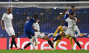 Rennes defender Dalbert concedes a penalty against Chelsea.