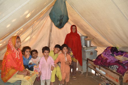 Sumera Bibi in her tent at the camp with her mother and family.