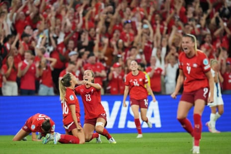 Switzerland’s Viola Calligaris, Lia Walti and teammates celebrate after the final whistle.