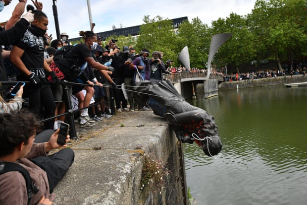 7/6/2020 Protesters throwing the statue of Edward Colston into Bristol harbour during a Black Lives Matter protest rally