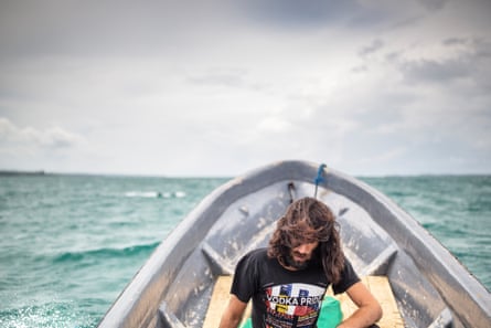Behrouz Boochani on a small boat.