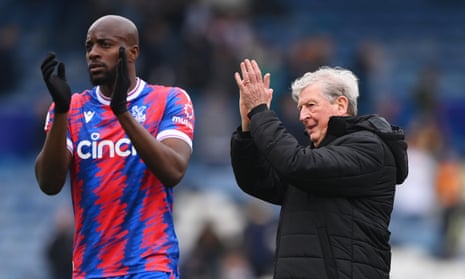 Roy Hodgson and Jean-Philippe Mateta applaud the Crystal Palace supporters after the 5-1 win over Leeds.