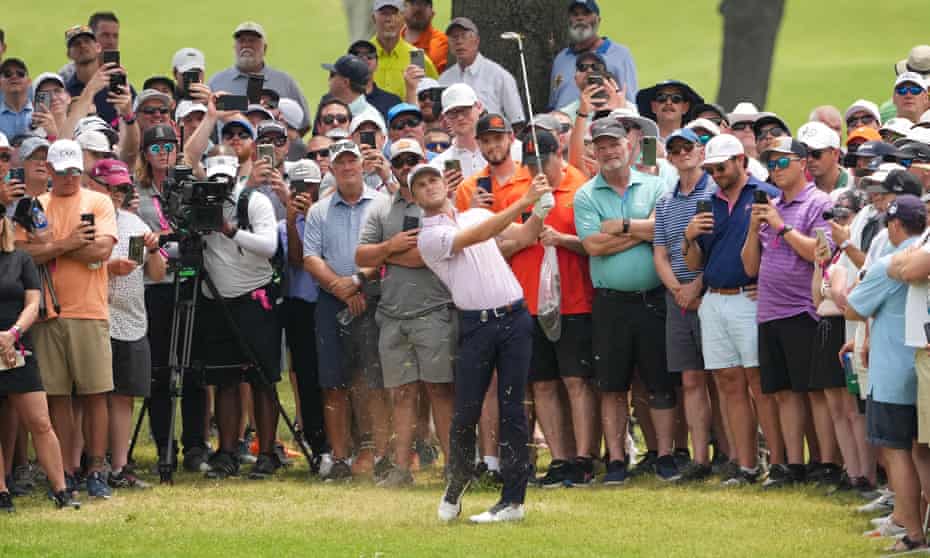 Will Zalatoris plays his shot from the gallery on the first fairway during the second round of the US PGA Championship at Southern Hills Country Club.