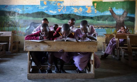 Masai children studying in a classroom of Nkoilale Primary School in Narok district, Kenya. 