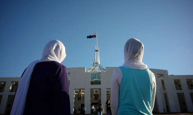 Afghan visitors wearing hijabs outside Parliament House in Canberra