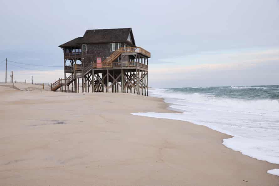 A house off Highway 12 in Rodanthe stands precariously on the beach.