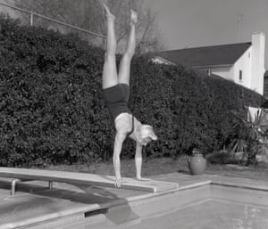 Doris Day diving into a pool in LA in 1950