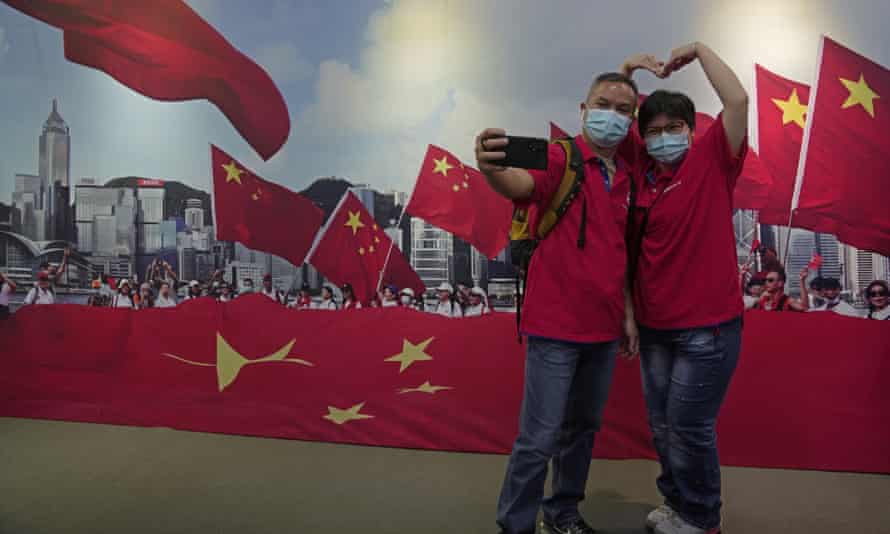 A couple in Hong Kong at an exhibition to mark the 25th anniversary of the former British colony’s return to Chinese rule