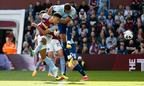 Aston Villa’s Ollie Watkins heads goalwards against Brentford.