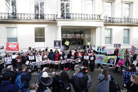 Relatives of people who died during the pandemic outside the Covid inquiry today.