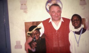 John and Justin with their foster father.