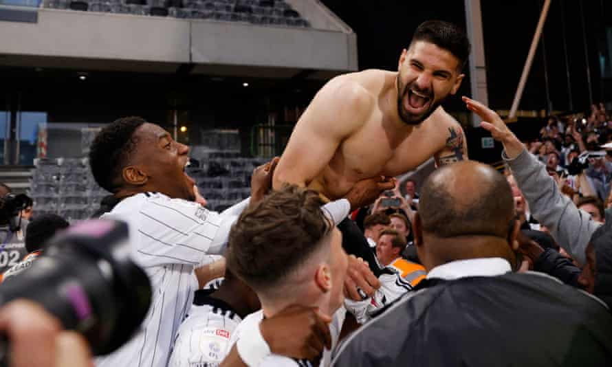 Aleksandar Mitrovic celebrates scoring the seventh goal.