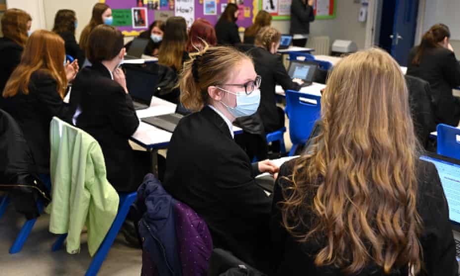 Students at Hailsham community college in East Sussex wearing masks in the classroom