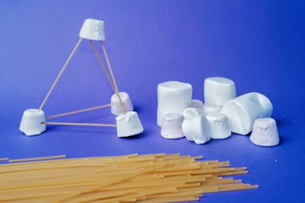A marshmallow tower built with spaghetti