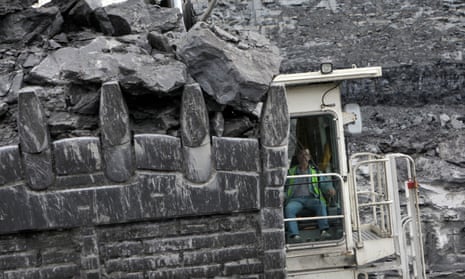 Coal is moved by heavy machinery at the Lodge House surface coal mine operated by U.K. Coal Plc., in Ilkeston, U.K., on Wednesday, Aug 4, 2010. U.K. Coal Plc., is the country’s biggest producer of the fuel. 